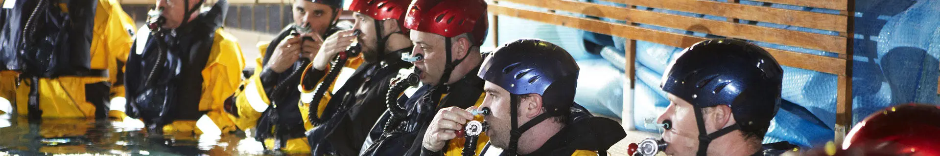 BOSIET delegates in the pool with breathing apparatus