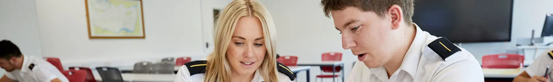 Two deck cadets studying in the classroom