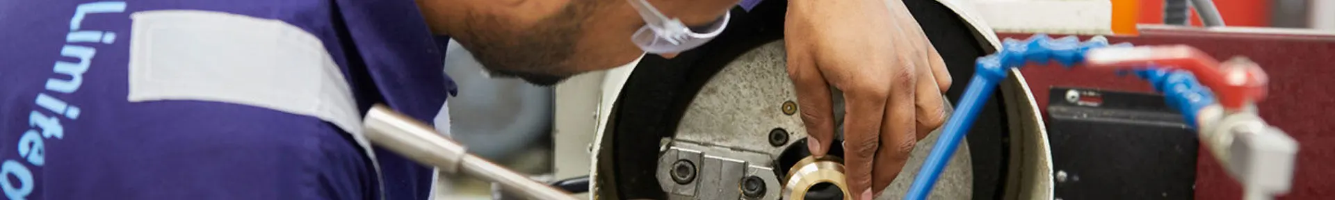 An engineer officer of the watch student doing MNTB workshop skills training in the engineering workshops