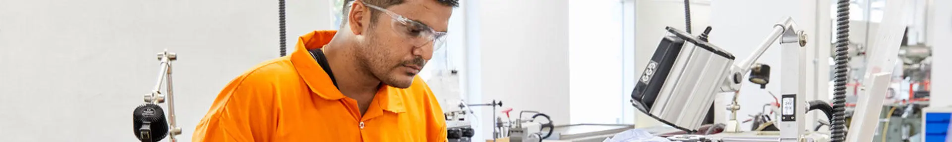 An engineer officer of the watch student undertaking workshop skills training in the engineering workshops