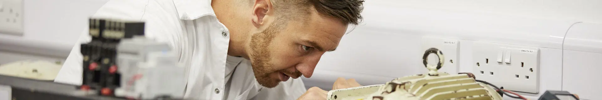 An ETO cadet working on some equipment in the ETO lab at St Mary's