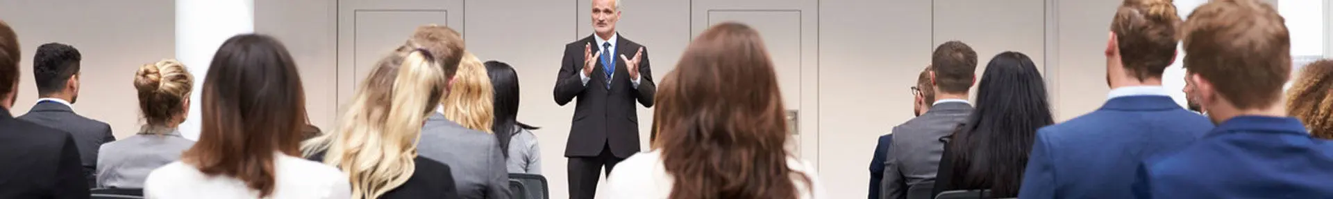 A large group of students attending a lecture