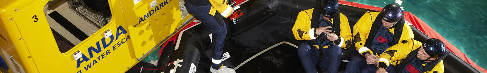 Students in an inflatable liferaft in the pool