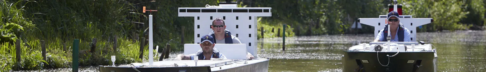 Ship handling students in two of the manned models at Timsbury Lake