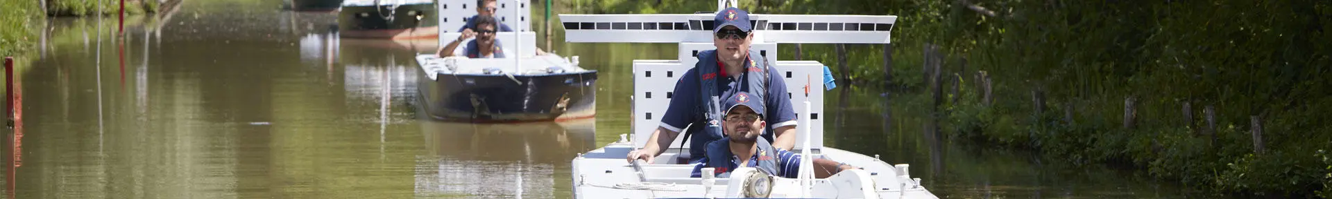 Senior deck officers on one of the manned models at the ship handling centre