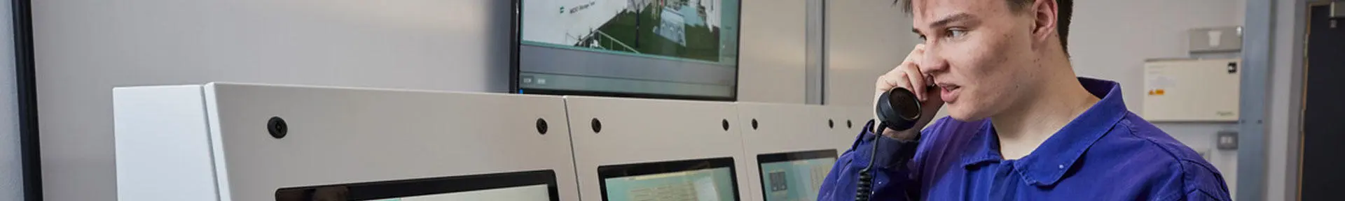 Engineer in the control room of the engine room simulator