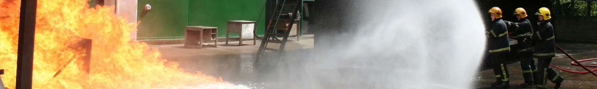 Students putting out a fire at the fire ground