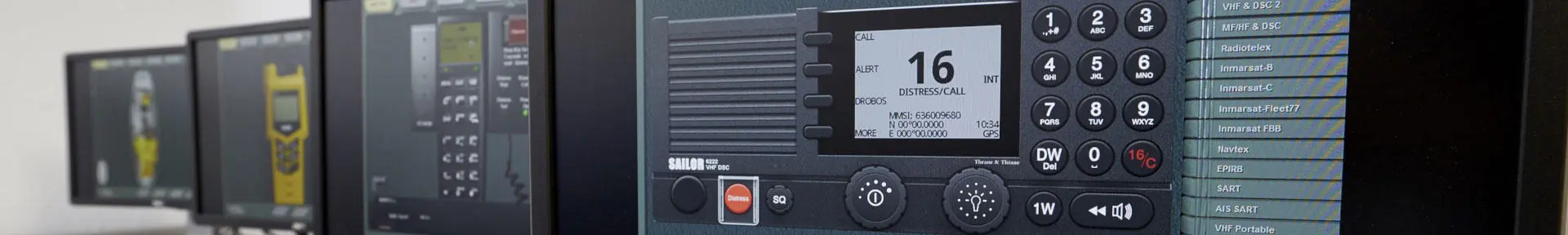Monitors showing the software used in the radio communications centre