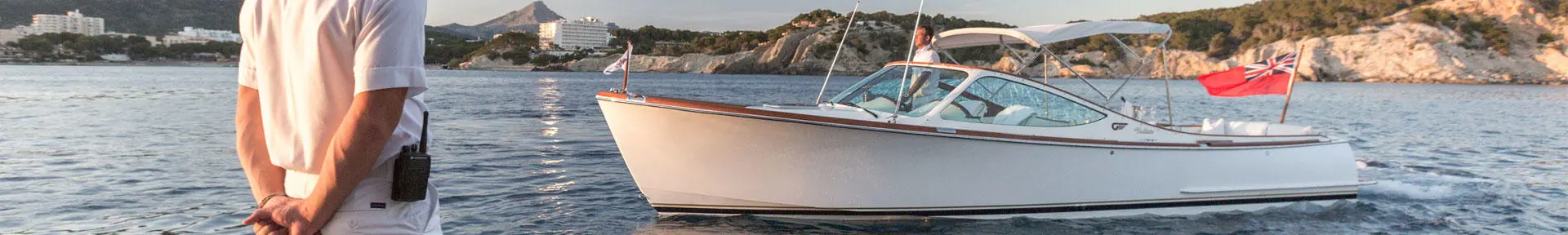 A superyacht deck officer looking at a tender