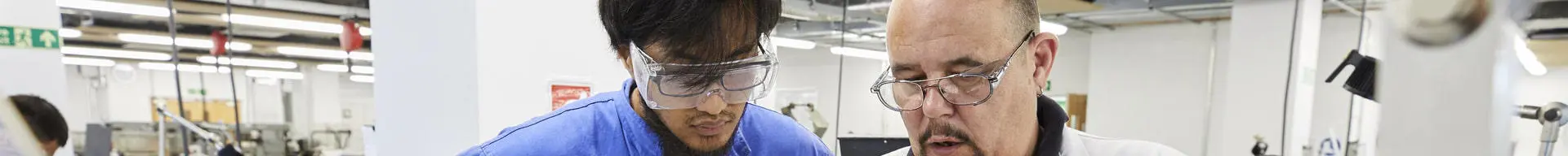 cadet and lecturer in the engineering workshop