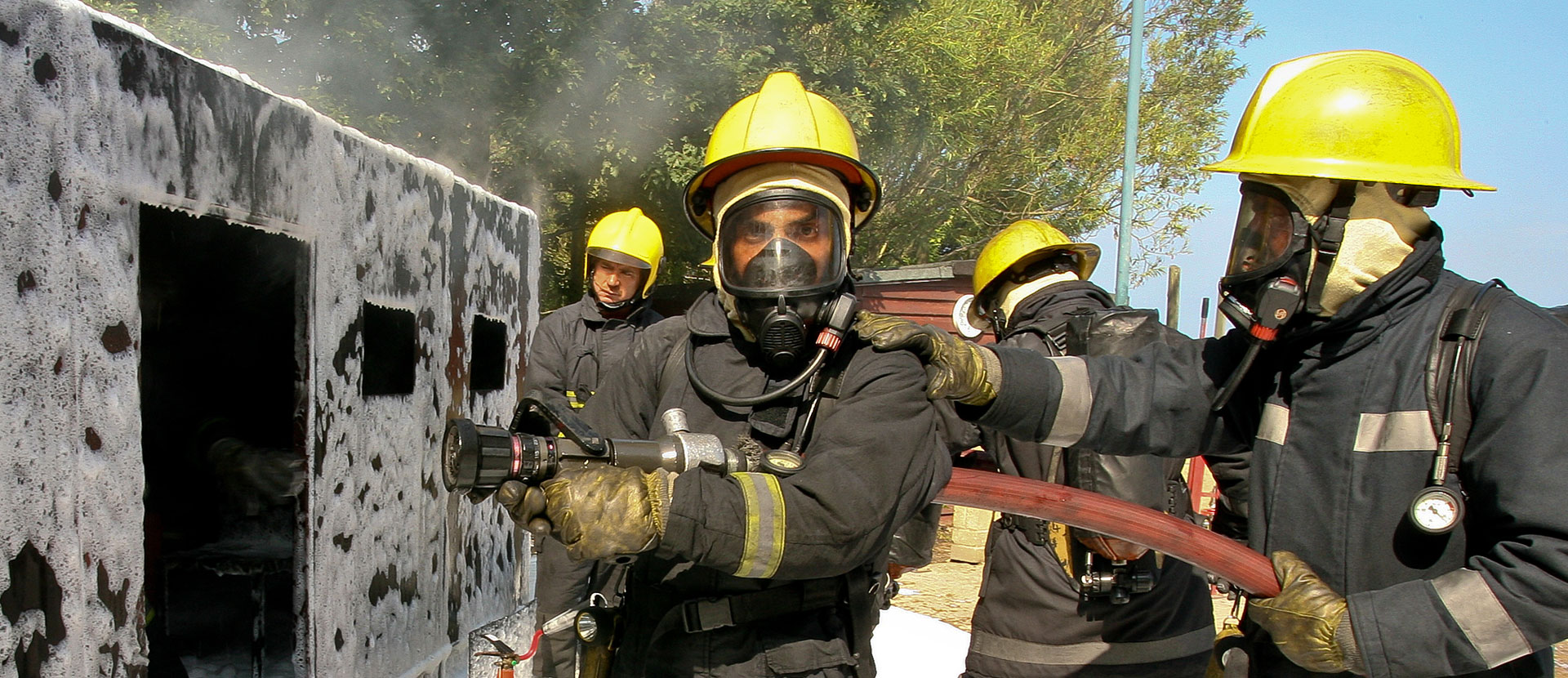 Cadets training at the fire school in full gear