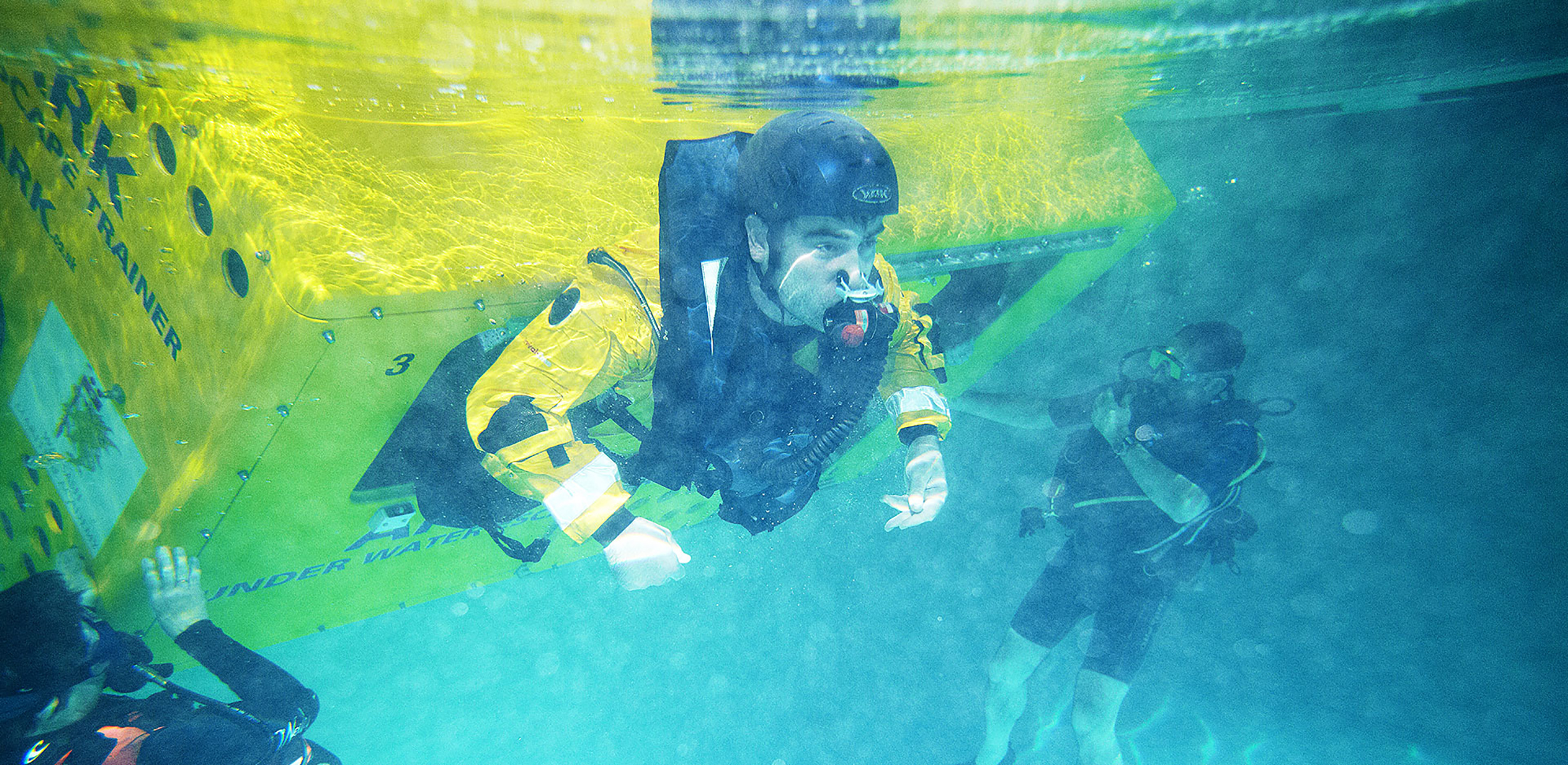 Student escaping from a capsized vessel