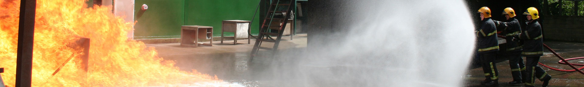 Students putting out a fire at the fire ground