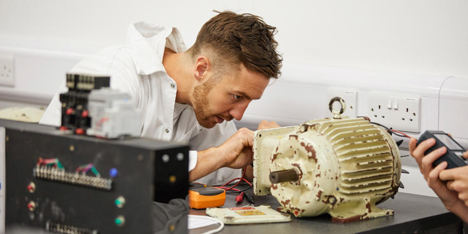 Engineer fixing a motor