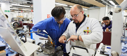 Eningeering cadet and lecturer in the Marine Engineering Workshop