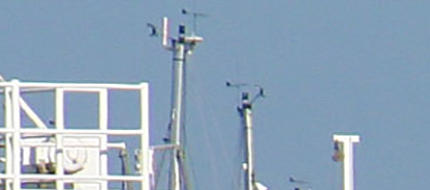 Lifeboat suspended at the end of the pier by the Hamble River