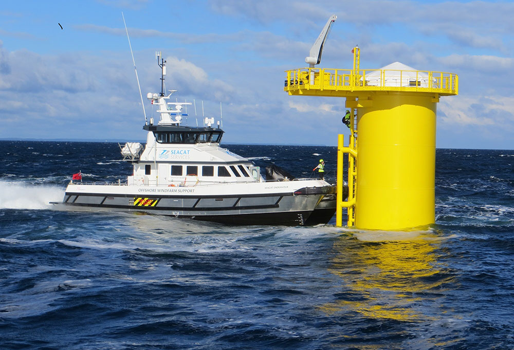 A Seacat offshore support vessel approaching an offshore installation